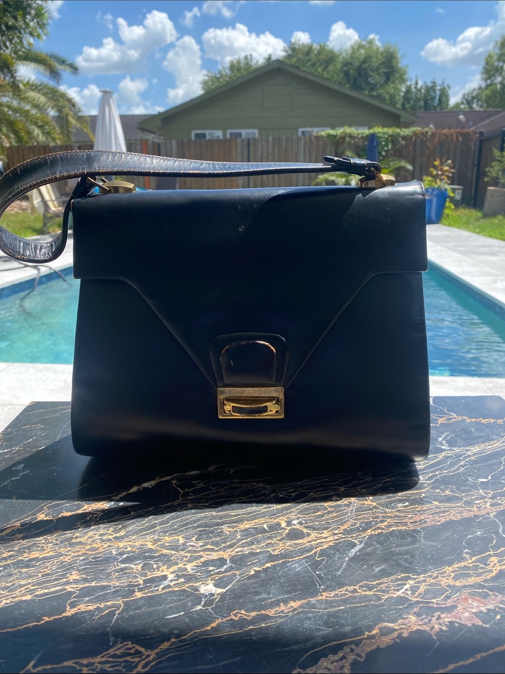 Classic Black Leather Shoulder Bag with Gold Tone Hardware